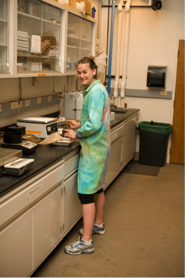 Girl standing working on lab 
